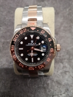 Replica Rolex GMT Master II Rose Gold (100704CH)